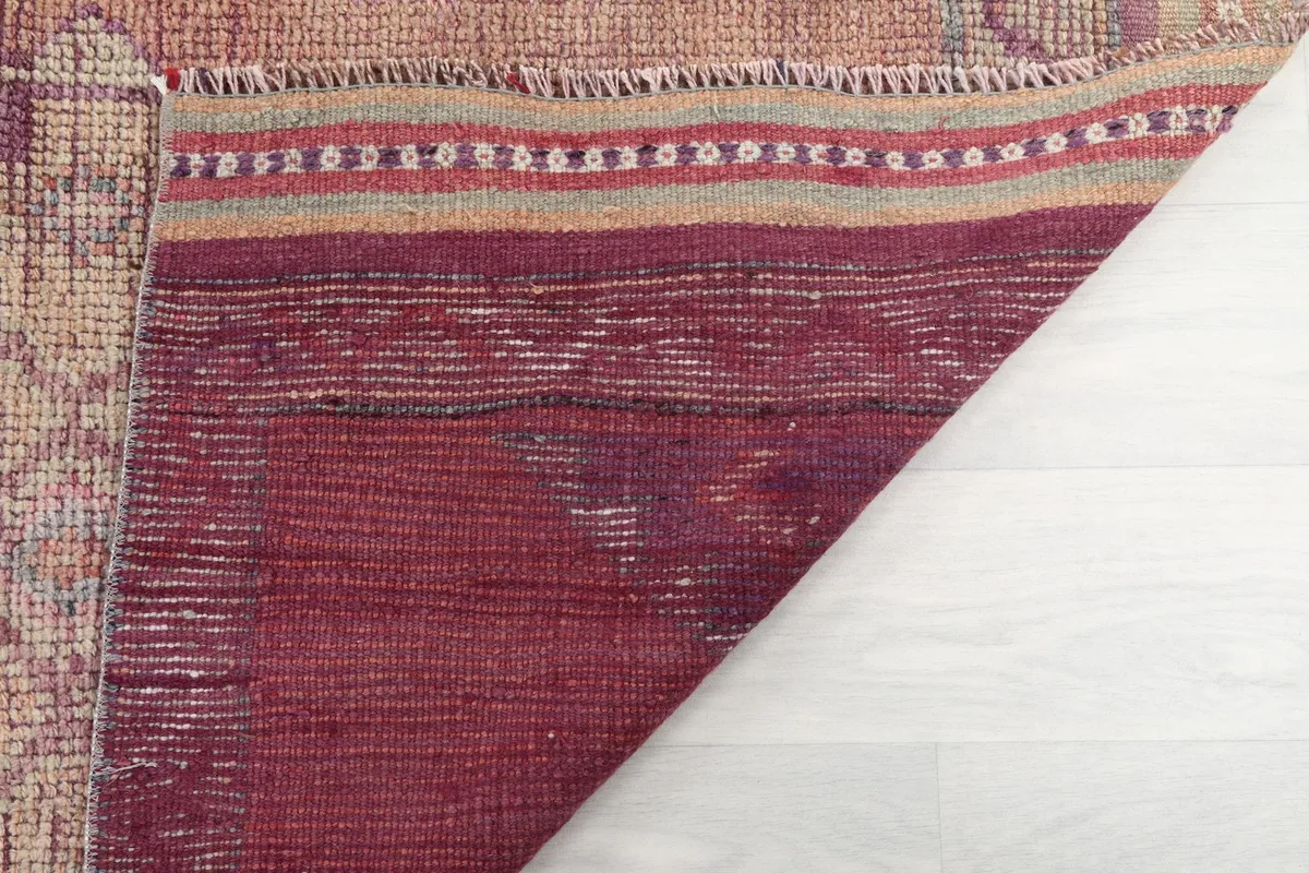 Close-up of the back of the vintage Anatolian runner, showing the tightly woven knots and foundation