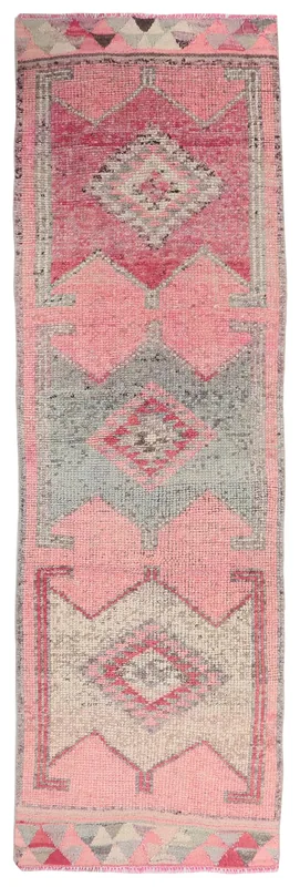 Full top view of the 2'11" x 9'5" rose and gray geometric Anatolian runner rug