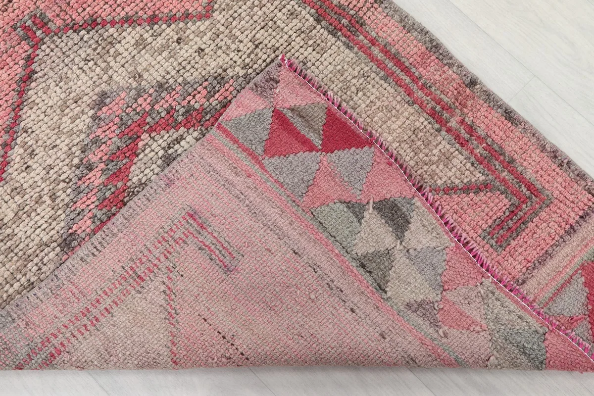 View of the reverse side of the hand-knotted runner, showing the foundation and knotting