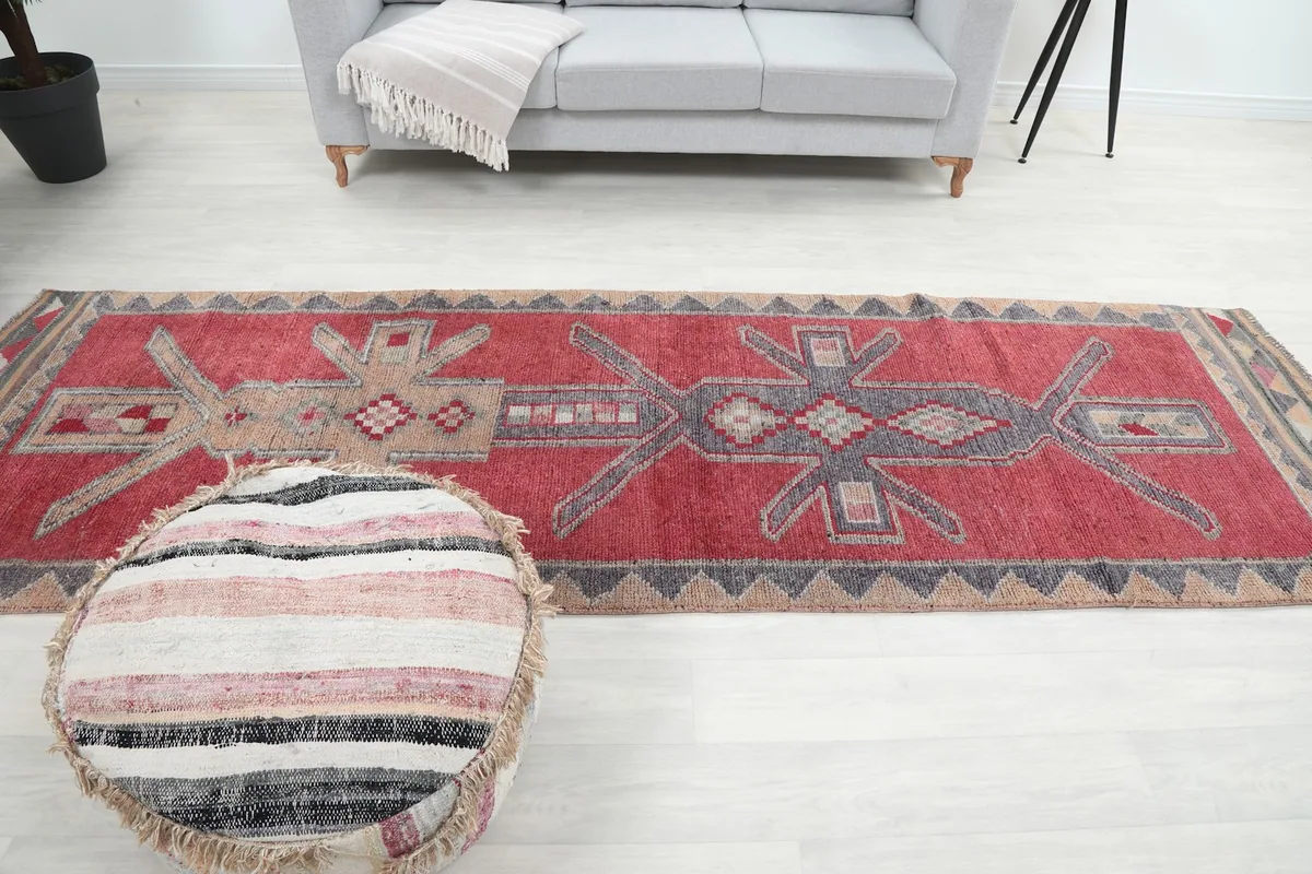 Full view of the Red Tribal Figure Runner in a room, from a higher perspective