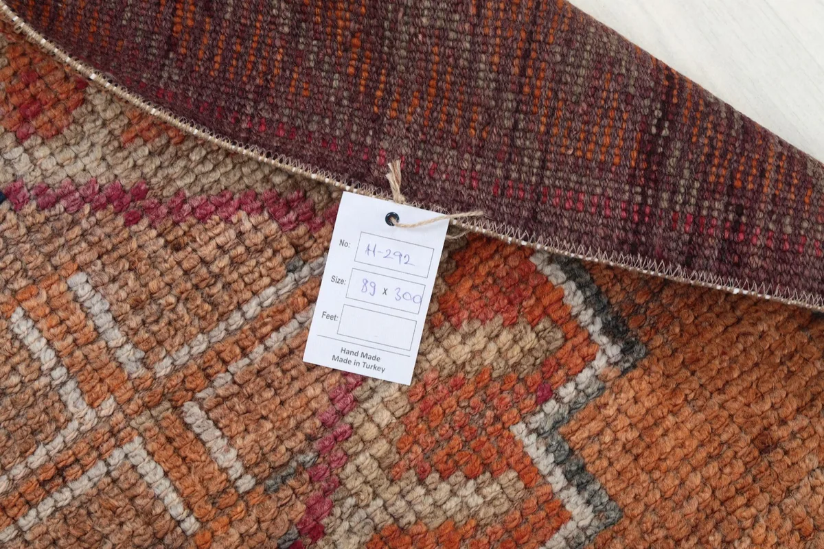 Image showing the product tag with rug details and origin attached to the rug's back