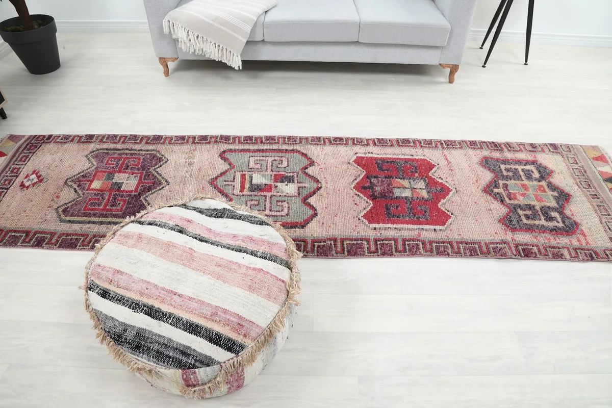 Full overhead view of the runner rug in a room, showing its length and patterns