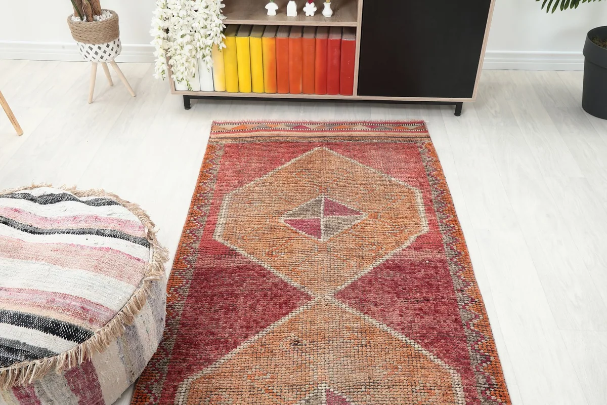 Overhead angle of the runner rug from one end in a room