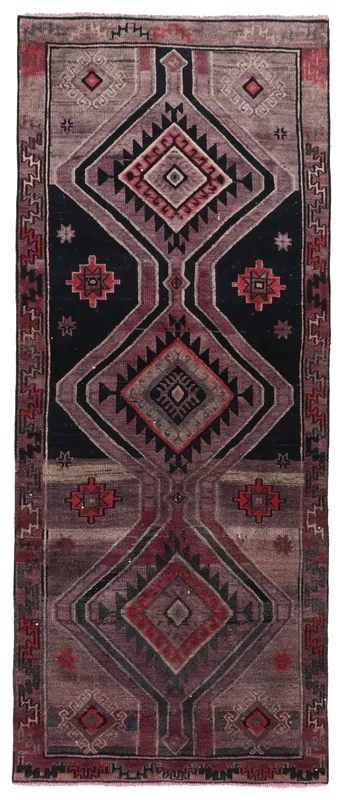 Full top view of a charcoal and red geometric Anatolian runner rug