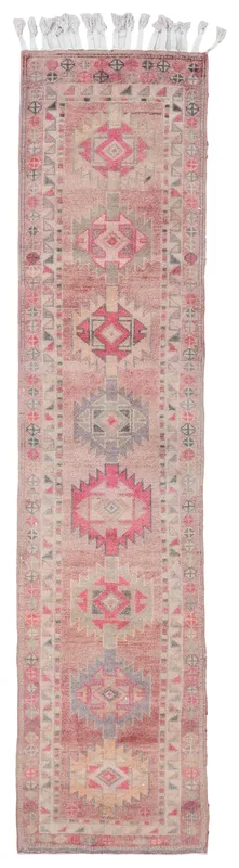 Full overhead view of the 2'11" x 12'8" muted rose geometric vintage Anatolian runner rug.