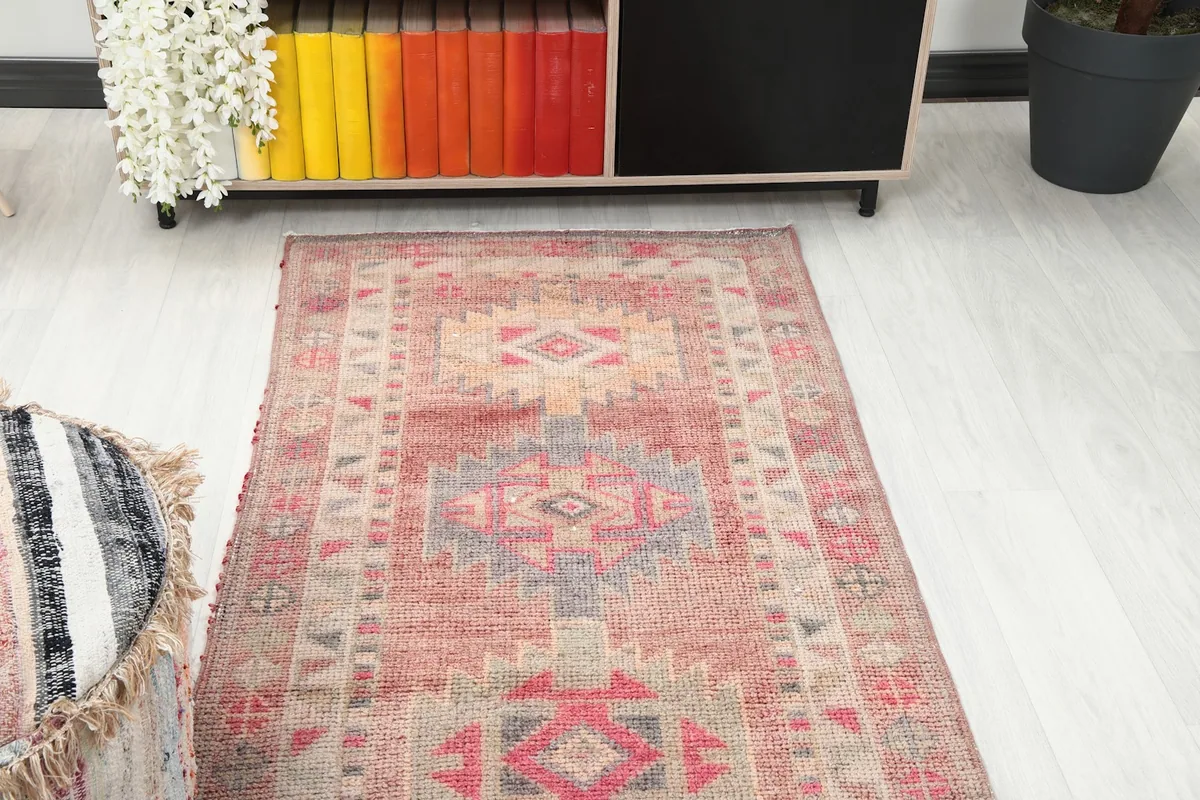 Overhead view of the runner rug in a room, showing its placement relative to furniture.