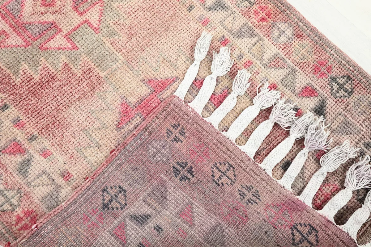 Backside of the hand-knotted Anatolian runner rug, revealing the foundation and fringe.