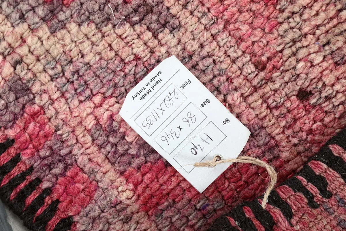Product tag showing the dimensions 2'10" x 11'4" (86 x 346 cm) and origin of the vintage runner.