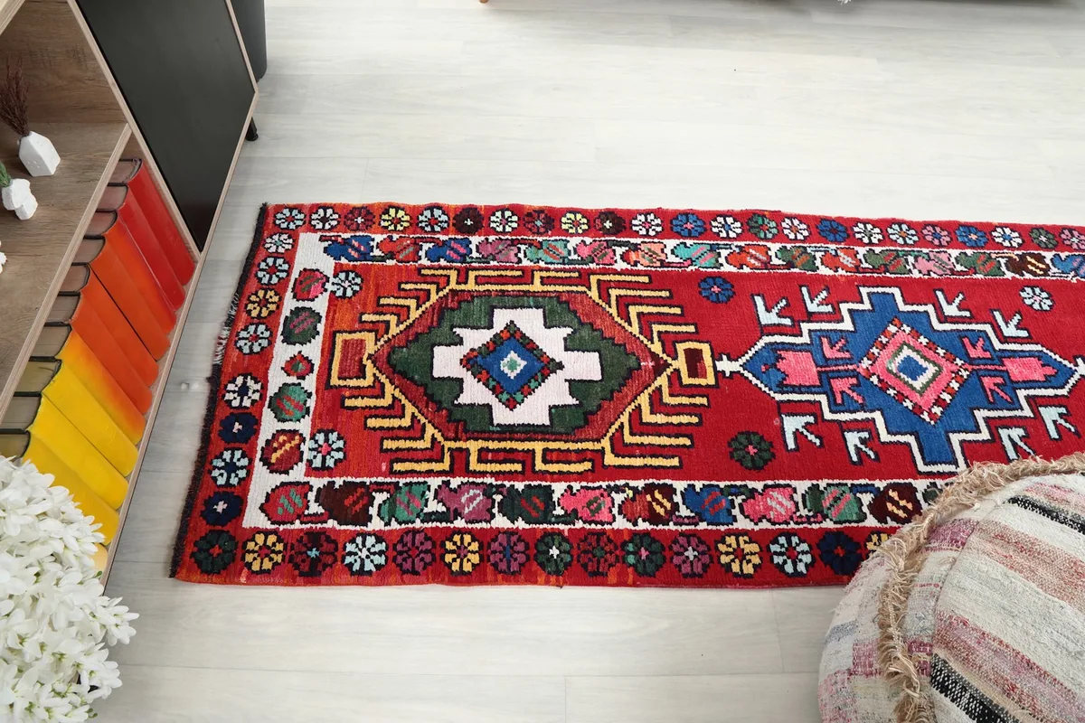 Angled view of the runner rug in a room, showing its length and how it complements the space