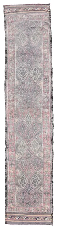 Full top view of the vintage Anatolian runner rug with geometric patterns in gray and rose.