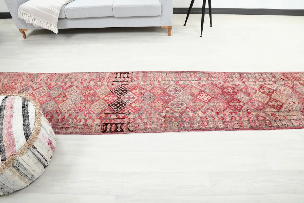 Overhead view of the runner rug, showcasing its linear design in a room setting