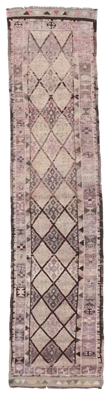 Full overhead view of the 3x13 beige and purple geometric runner rug on a white background.