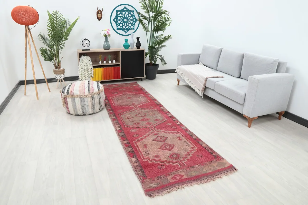 Angle view of the rose runner rug showing its length in a contemporary living space.