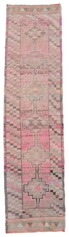 Full top view of the 2'7" x 11'4" vintage Anatolian runner with rose and gray geometric patterns