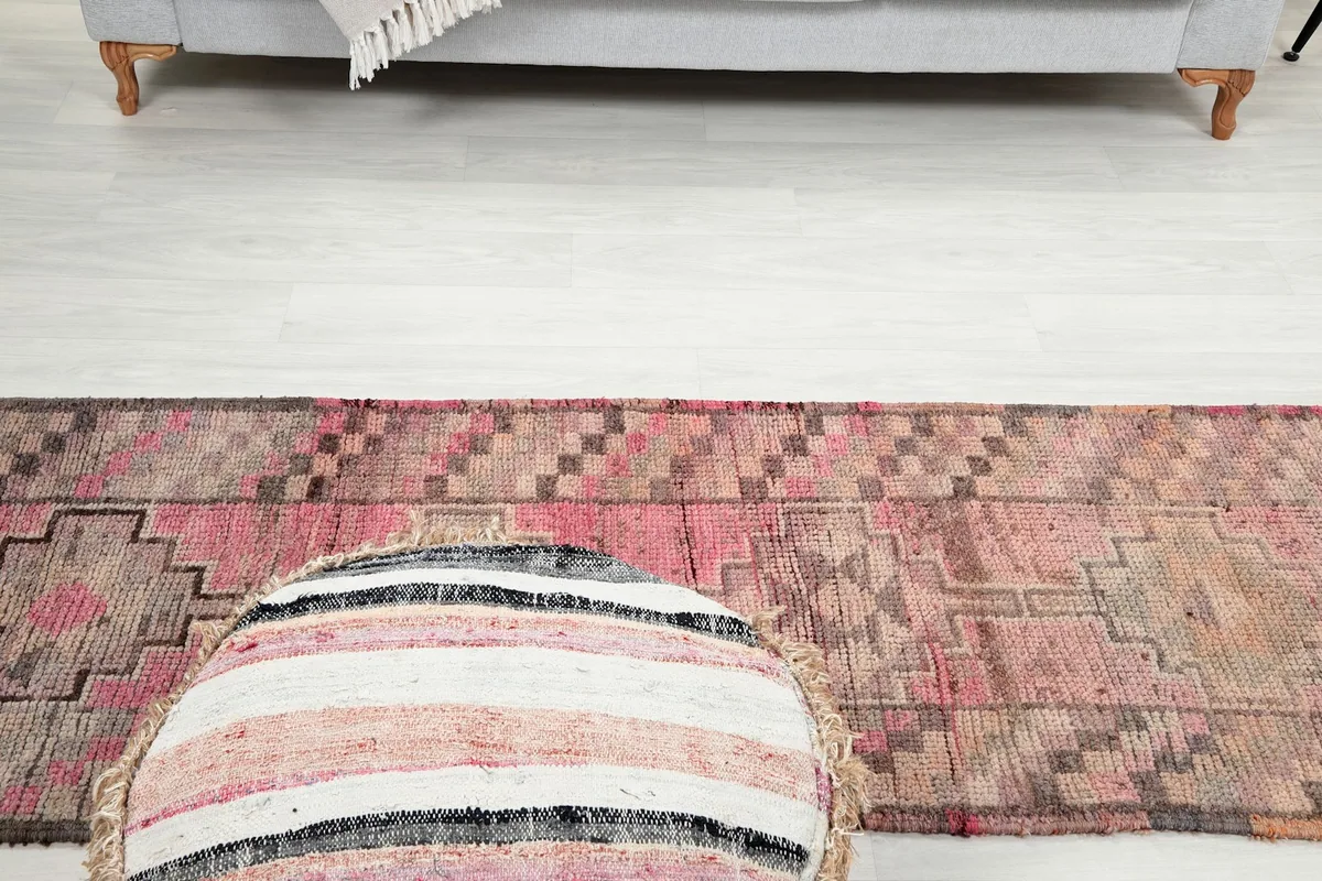 Top-down view of the runner in a room, emphasizing its length and how it anchors the space