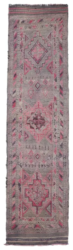 Full overhead view of the charcoal and pink geometric vintage runner rug
