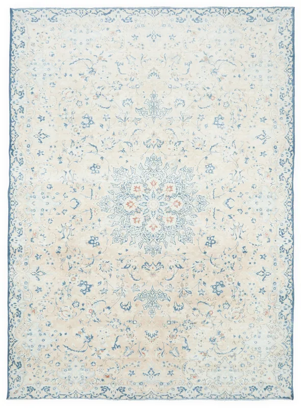 Full top view of the beige and blue floral medallion Persian area rug.