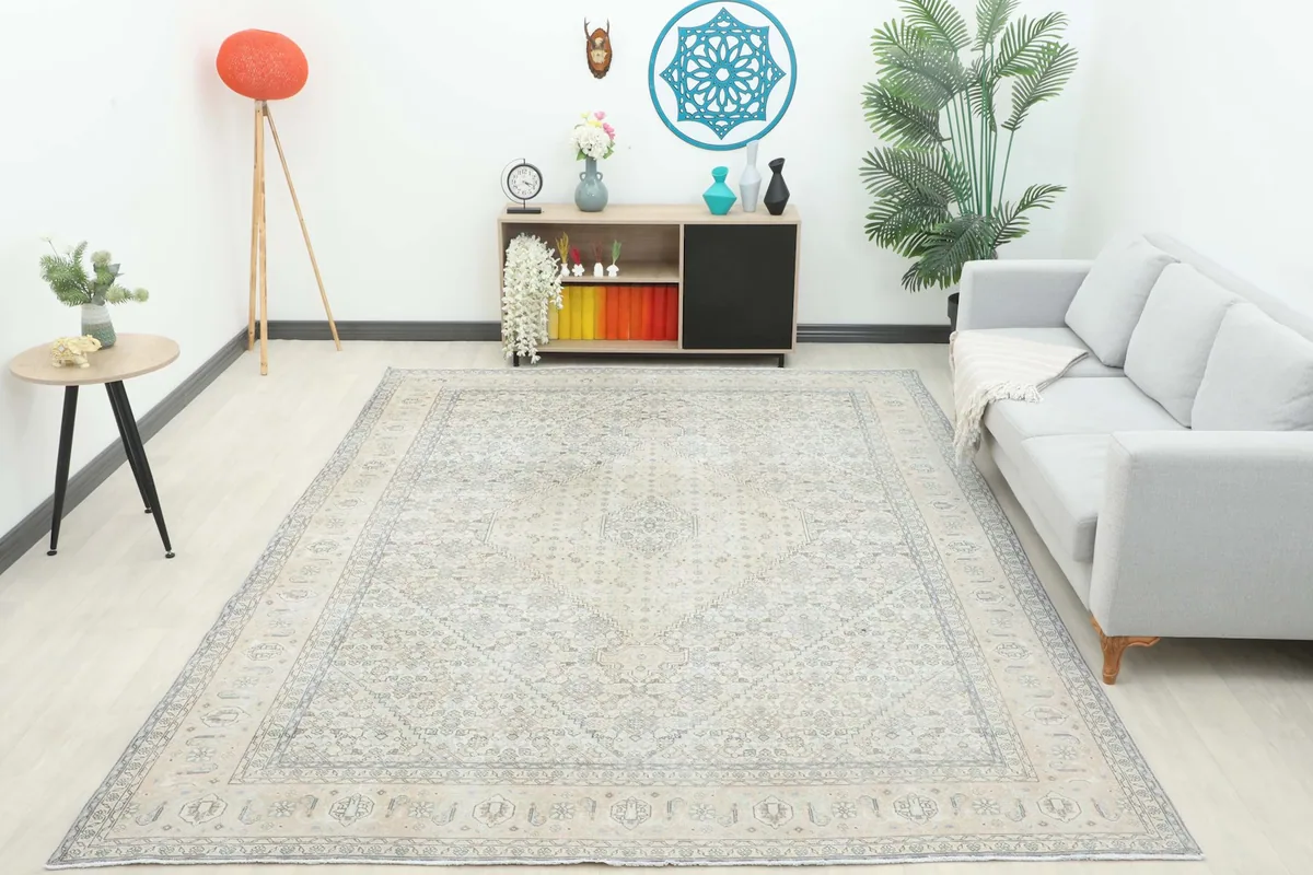 Full room view of the 8'4" x 11'5" Persian area rug, showcasing its presence in a modern living space.