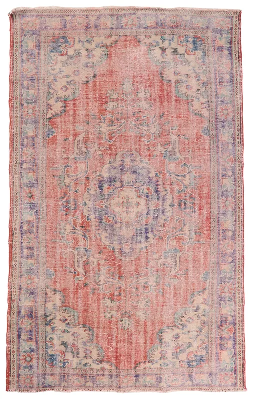Full overhead view of the vintage red and purple medallion area rug