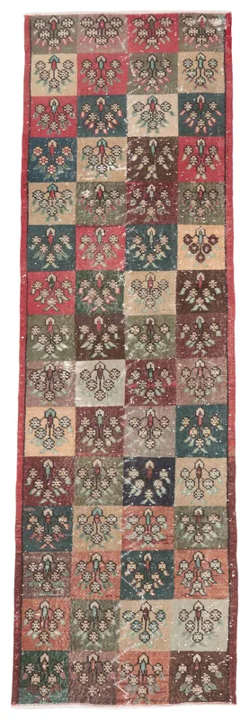 Full overhead view of the multicolor floral patchwork vintage runner rug