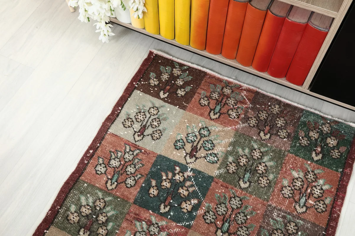 Runner rug from an elevated angle, showing its placement near a low cabinet