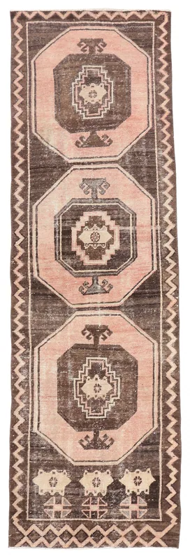 Full overhead view of the 3'1" x 10'2" vintage rose and brown Anatolian runner rug