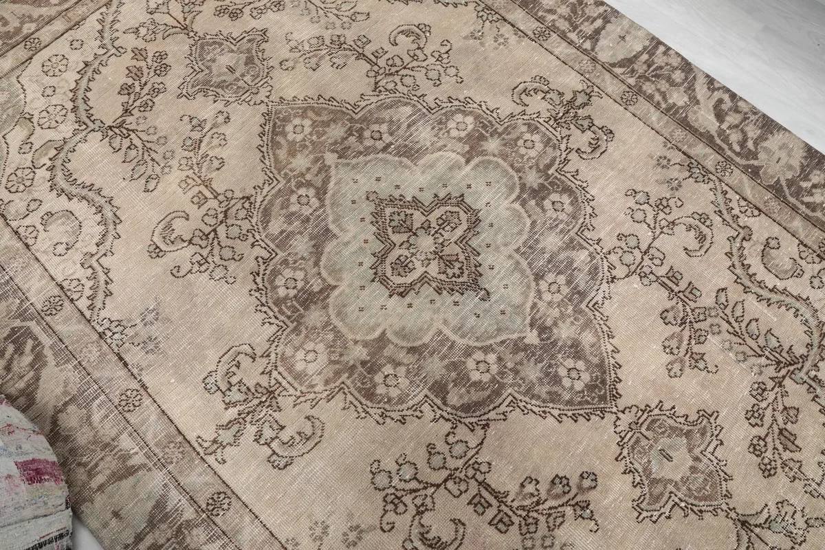 Overhead angle shot highlighting the central medallion and surrounding motifs
