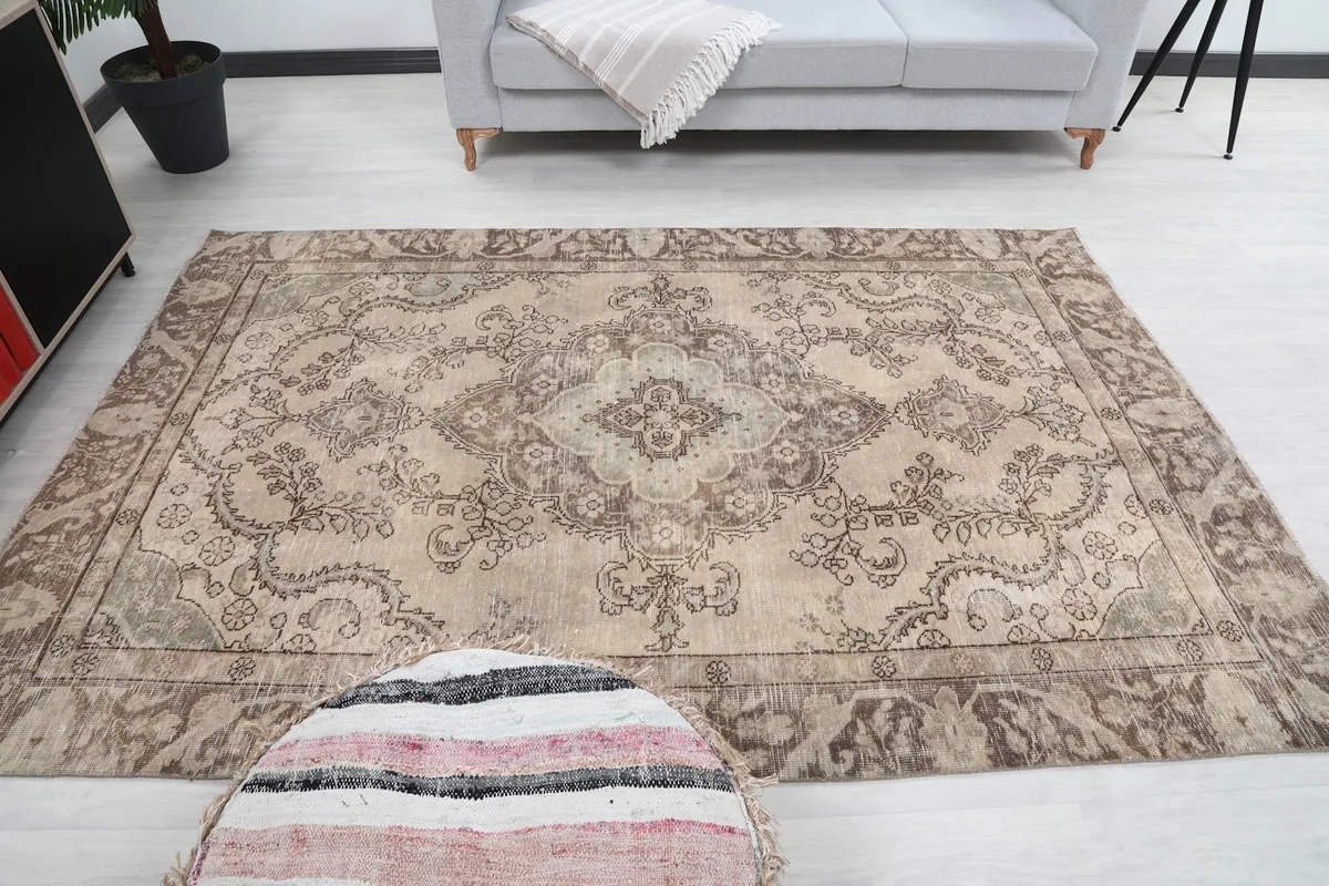 Overhead view of the rug in a room, emphasizing its full layout and size