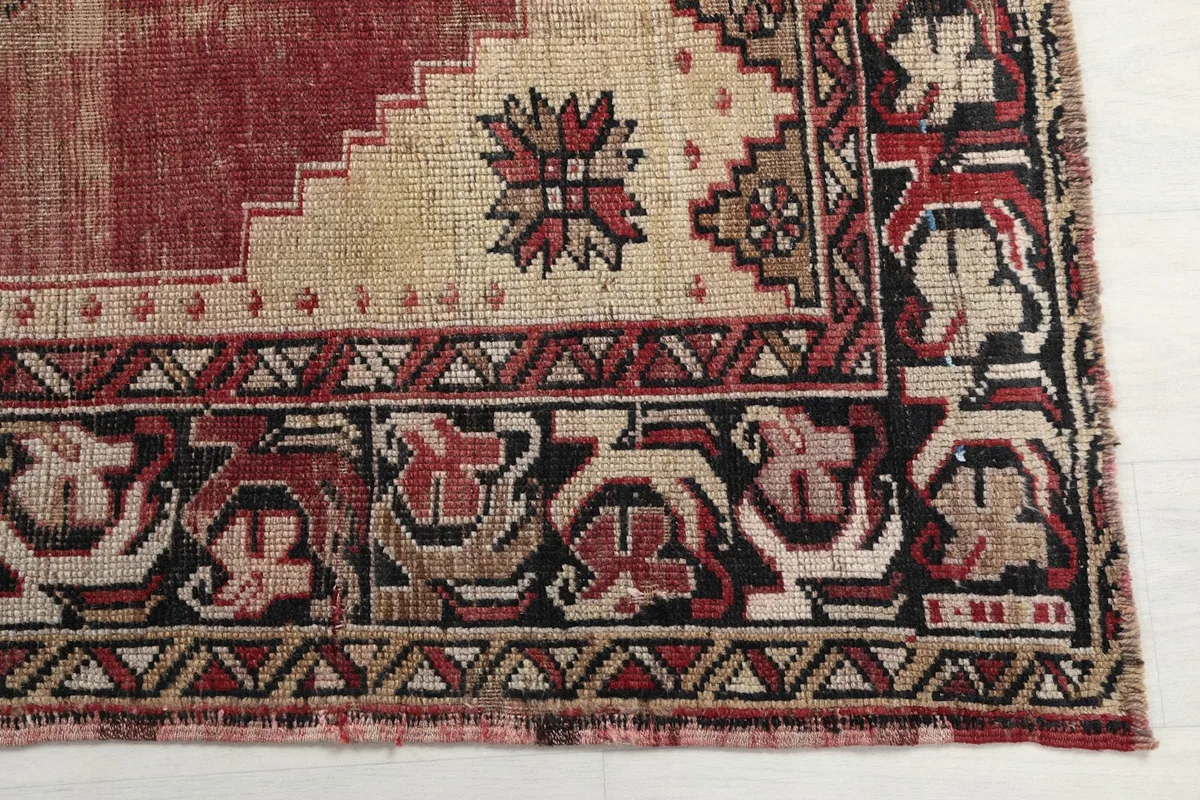 Detailed corner view of the runner rug, showing the border design and part of the main field.