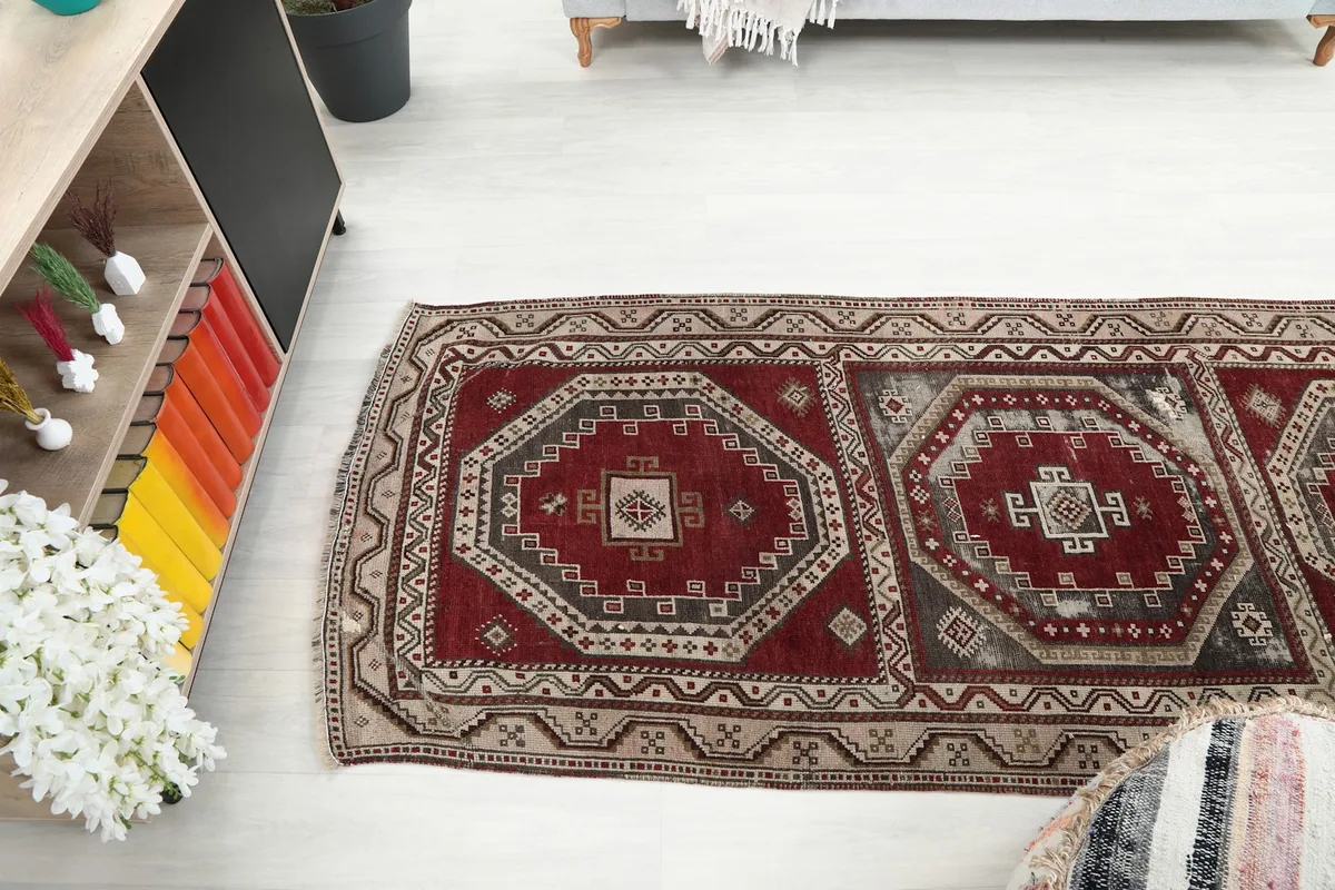 Overhead view of the runner in a room setting, showing its placement relative to furniture and decor.