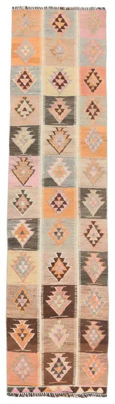 Full top view of the 2'6" x 10'7" vintage Anatolian runner with geometric squares in pink, orange, brown, and gray.