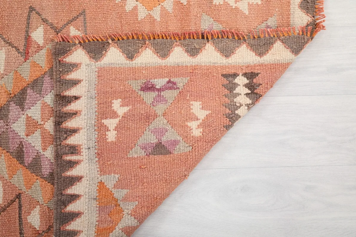 Another folded corner view, emphasizing the craftsmanship and material quality of the runner