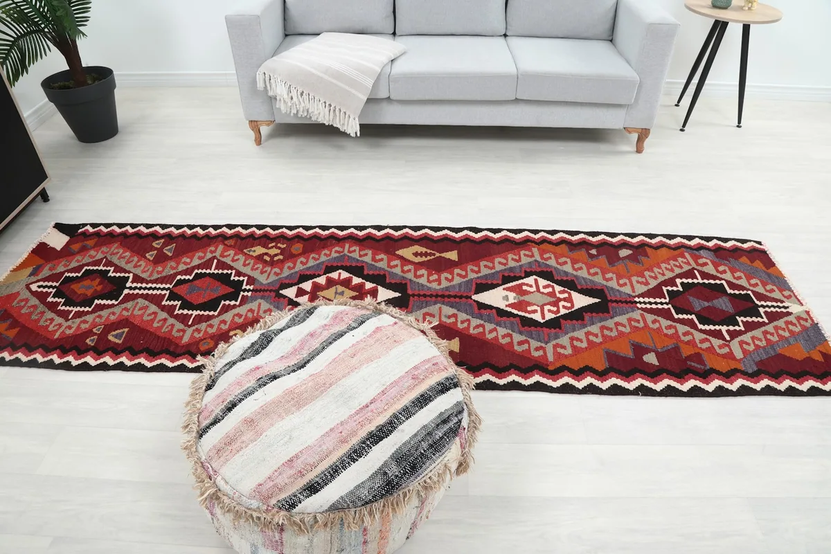 Full length of the runner rug in a room setting, showcasing its size and design