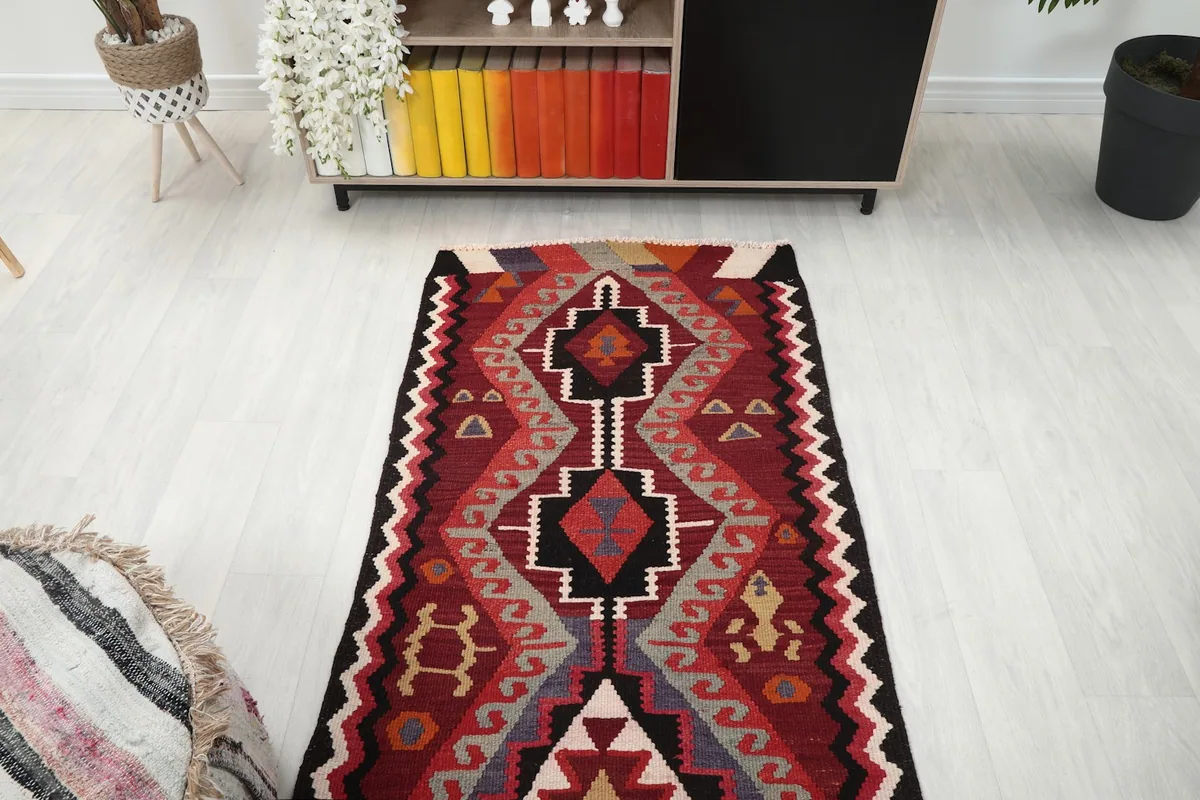 Overhead view of a section of the runner rug showing its symmetrical patterns