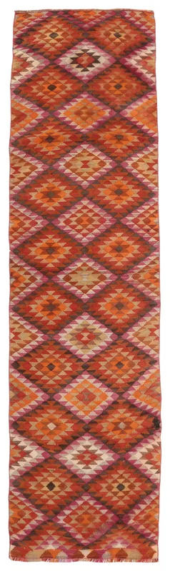 Full top view of the 2'11" x 11'2" orange and rust geometric Anatolian runner rug