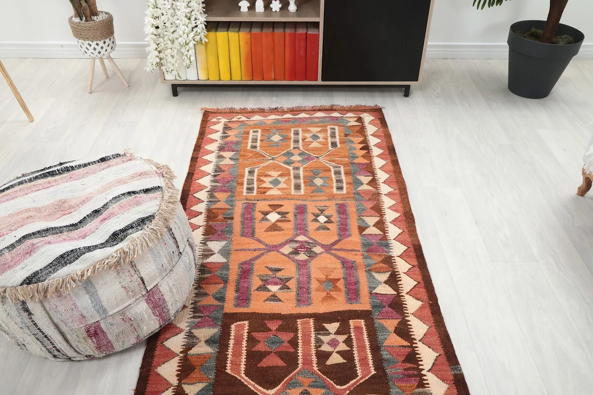 Overhead view of the runner rug in a room, showing its full length