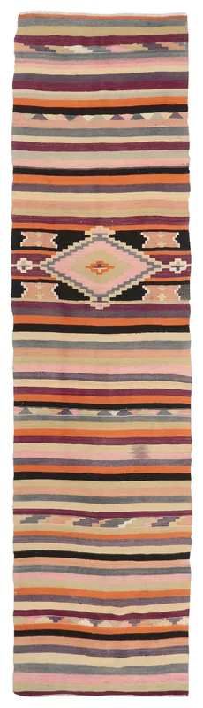 Top view of a beige, pink, and orange striped runner rug with a central geometric diamond motif.