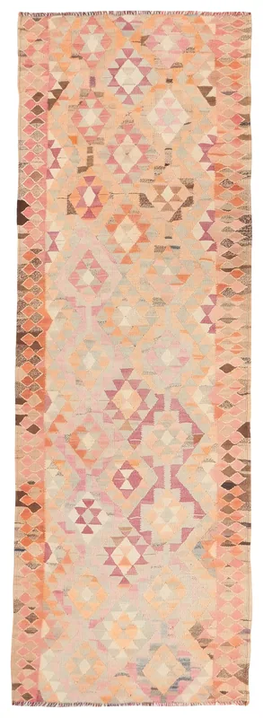Full top view of the 3'3" x 10'5" beige and rose geometric vintage Anatolian runner on a white background.