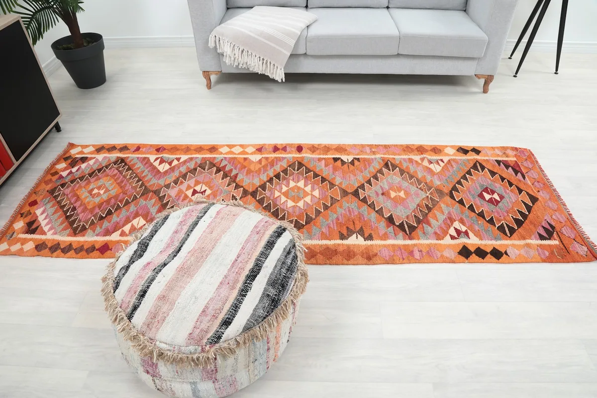 Full view of the runner in context with furniture, emphasizing its runner shape