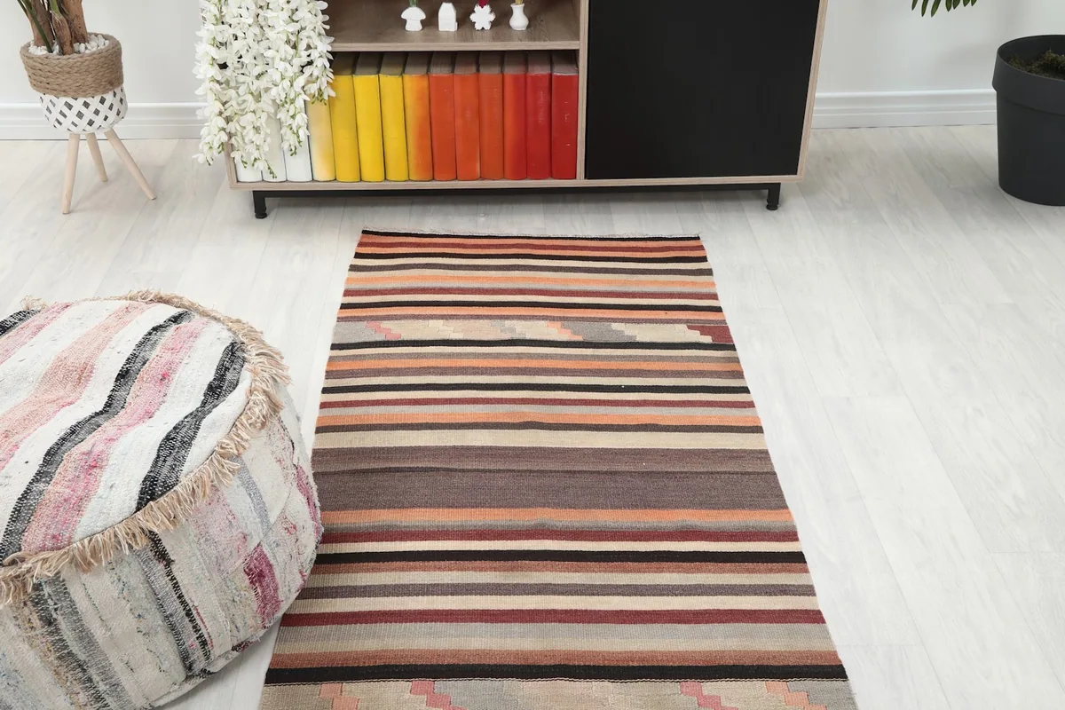 Overhead view of the runner in a room, showcasing its length and how it anchors the space between furniture.