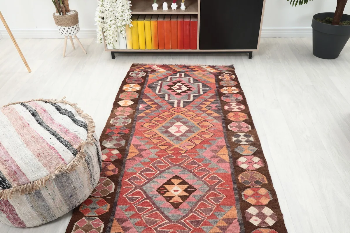 Another room view of the Anatolian runner rug, showing its length and placement in a contemporary space.