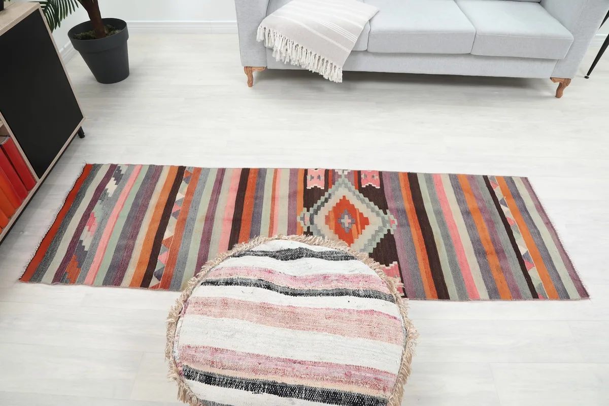 Full overhead view of the runner in the room, showcasing its entire length and central design.