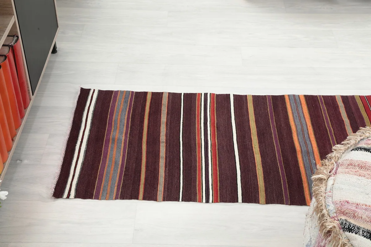 Overhead shot of the runner rug, showcasing its full striped design from a higher perspective.