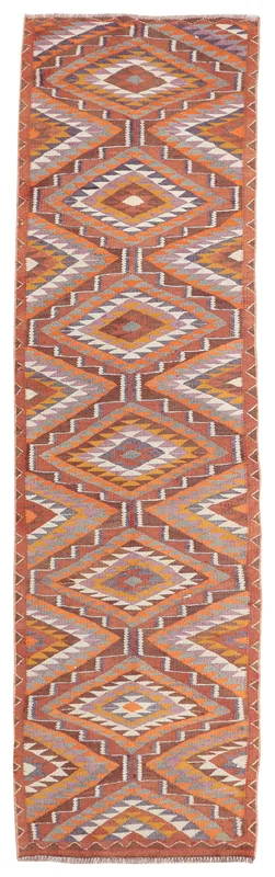 Full top view of the 3'1" x 12'0" vintage Anatolian runner rug with rust and geometric patterns.