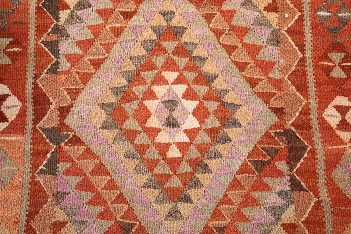 Overhead detail shot focusing on one of the large diamond patterns within the runner