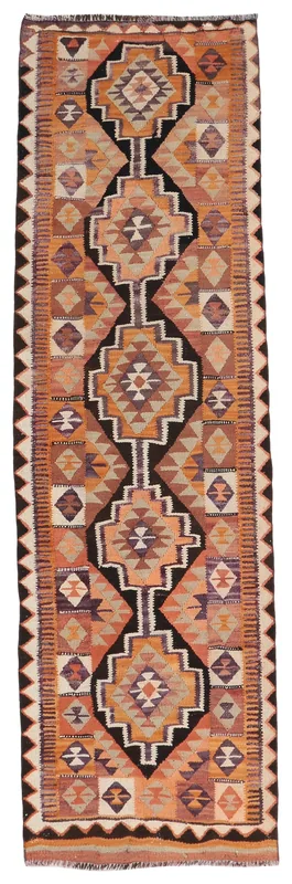 Full top view of the vintage orange and black geometric Anatolian runner rug