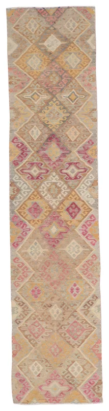 Full overhead view of the beige, rose, and gold geometric vintage runner rug