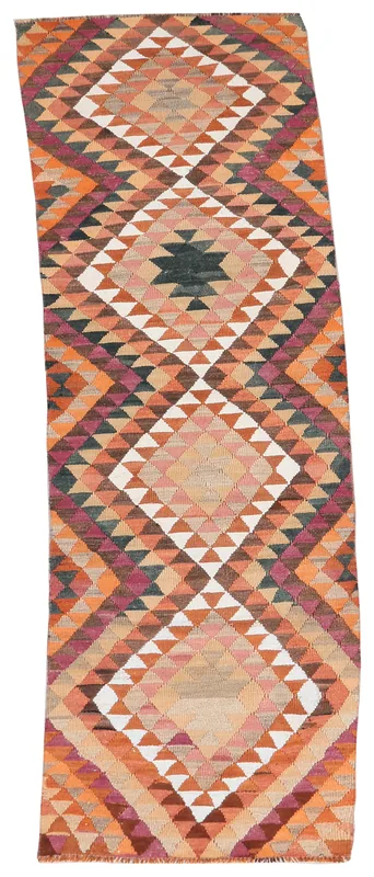 Full top view of the 2'9" x 11'7" orange and rust geometric vintage runner rug on a white background.