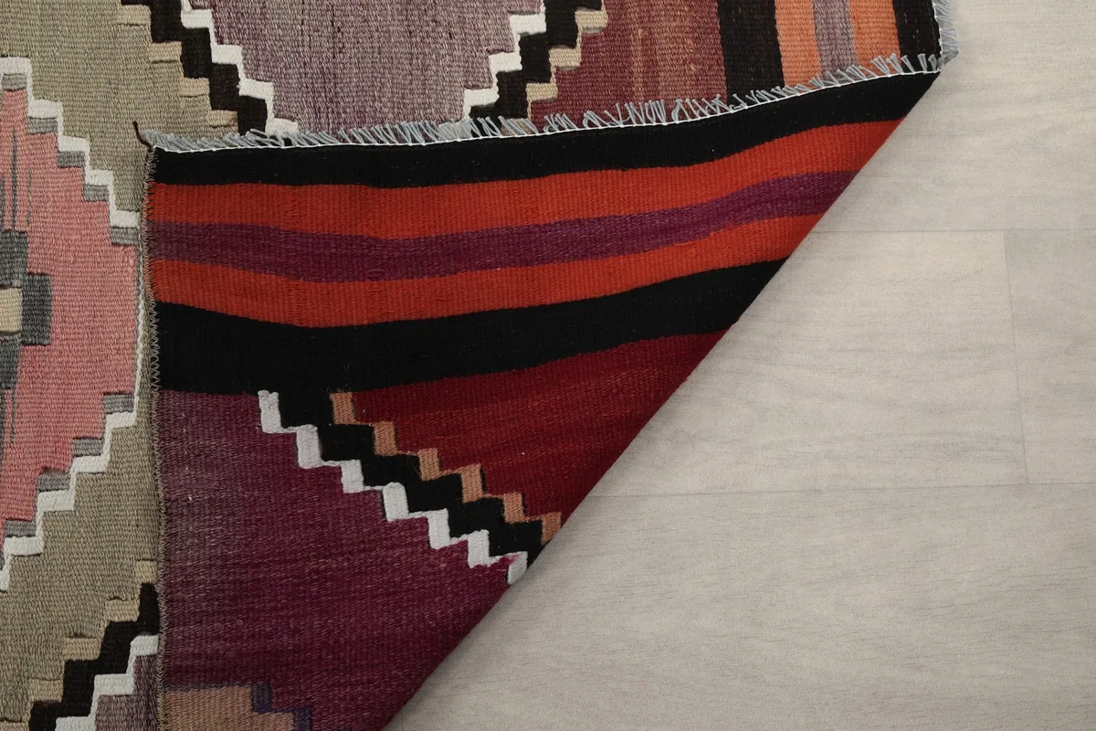 Close-up of the back of the rug, revealing the quality of the hand-knotting and material
