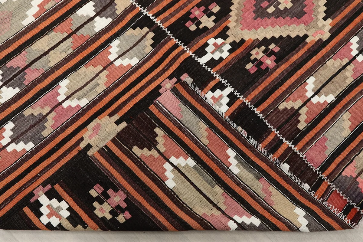 Folded section of the rug, revealing the wool pile and cotton foundation